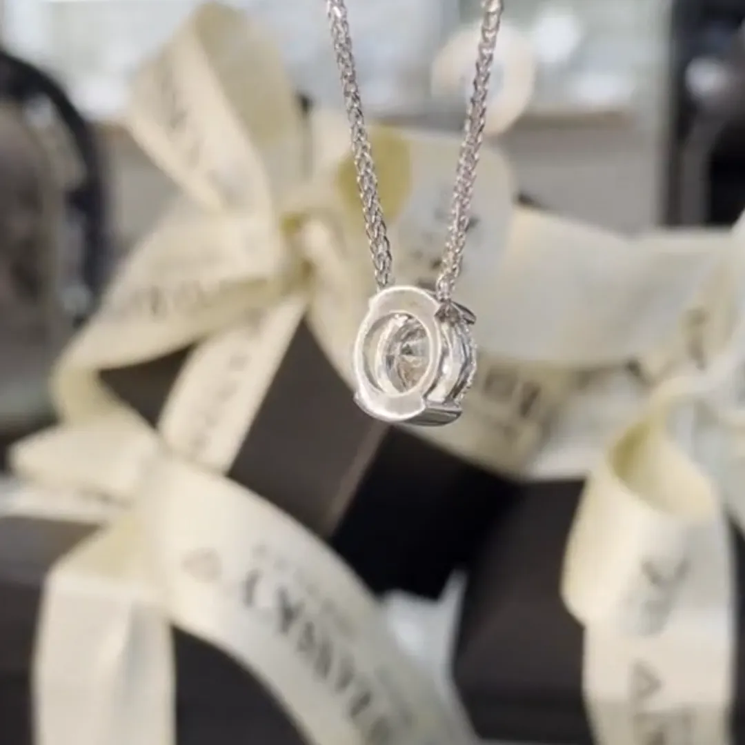 /public/photos/live/Round Moissanite Half Bezel Set Floating Pendant  628 (6).webp